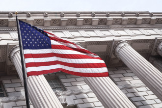 American flag in front of government building