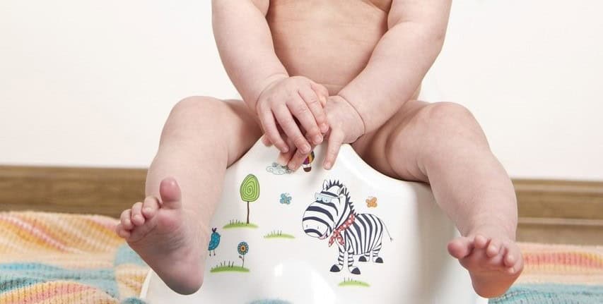 baby on training potty