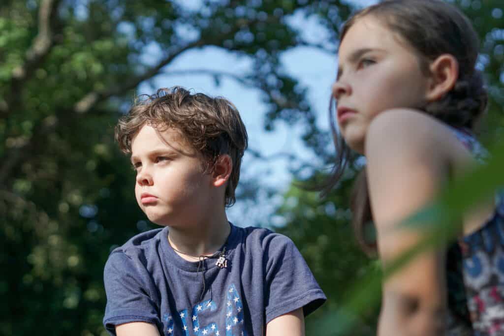 frowning boy and girl