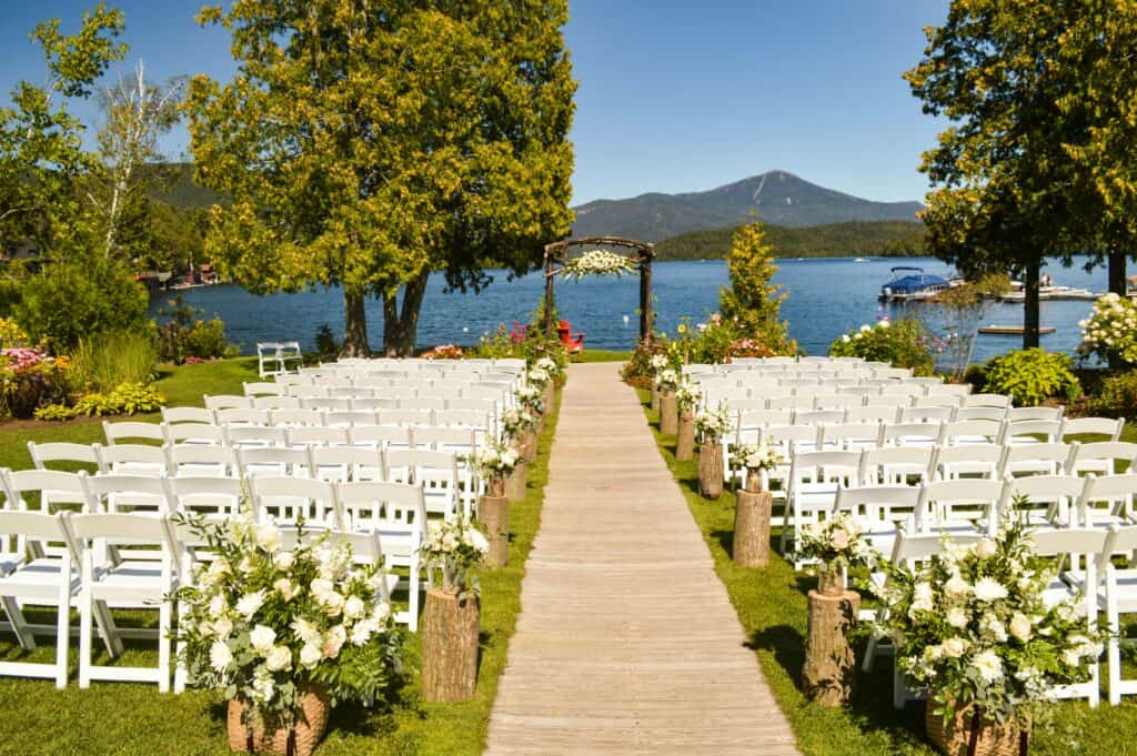 chairs set up for wedding by lake