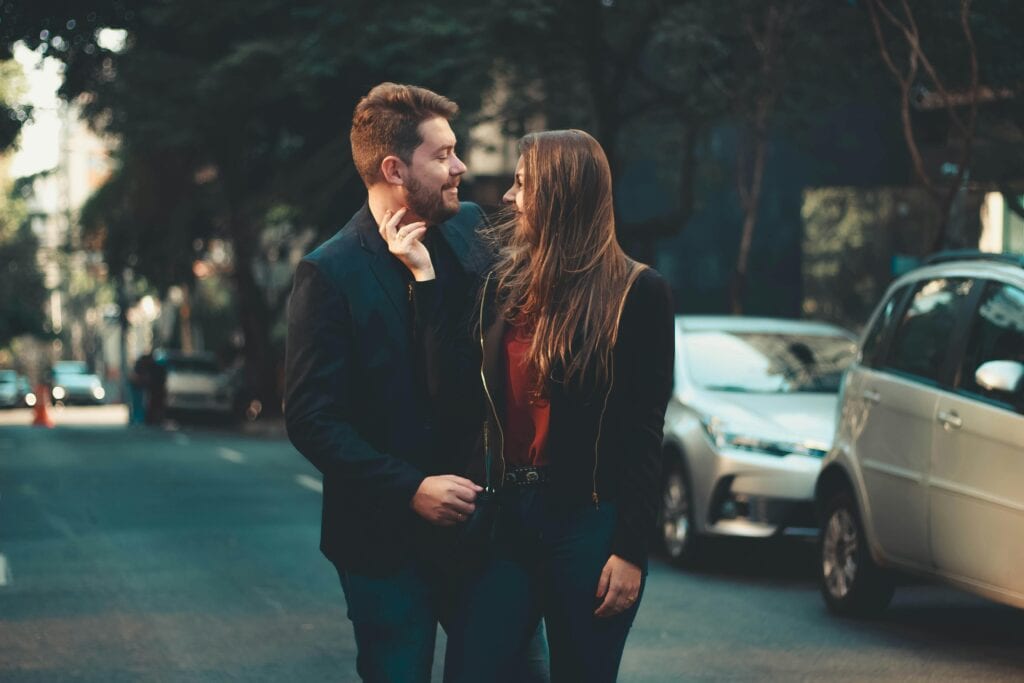 woman flirting with husband on street
