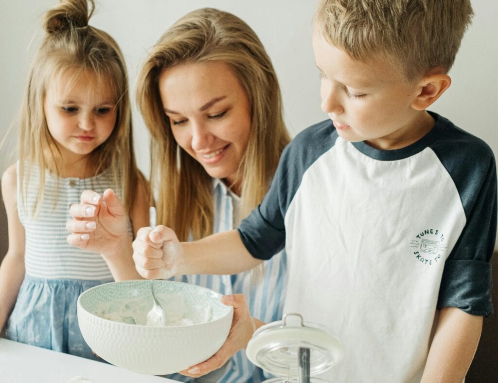 mom baking with boy and girl