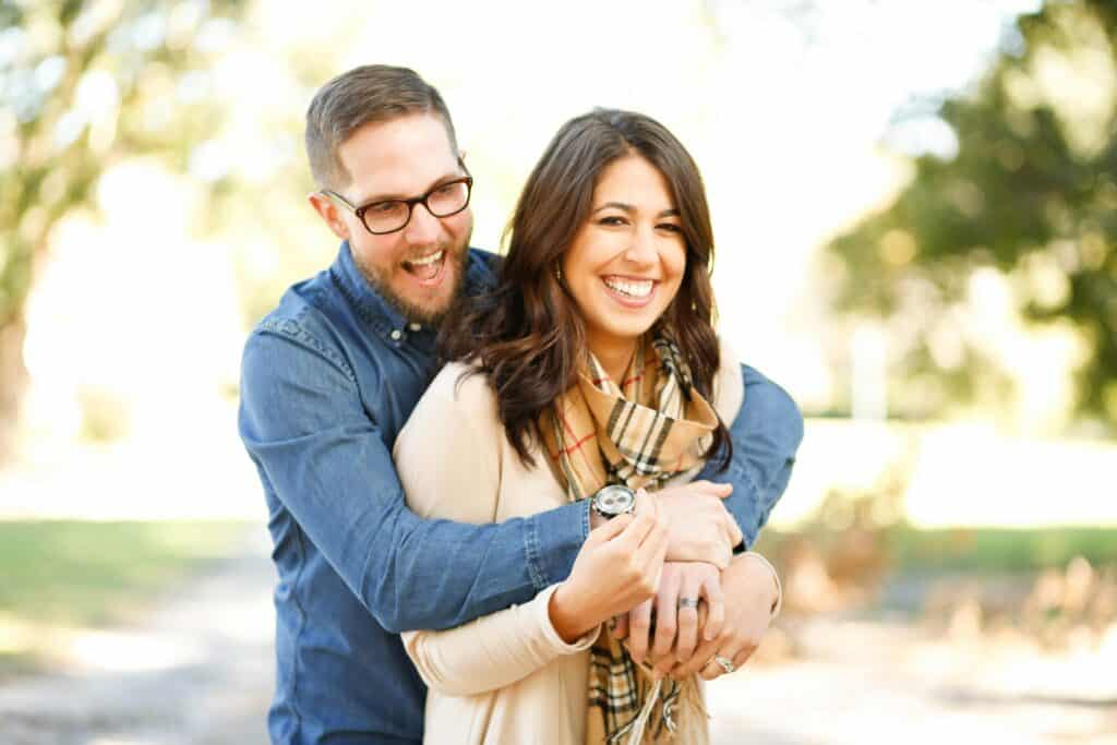 smiling young husband and wife