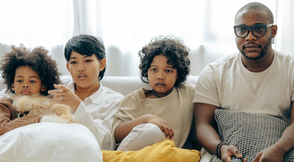 family watching TV together