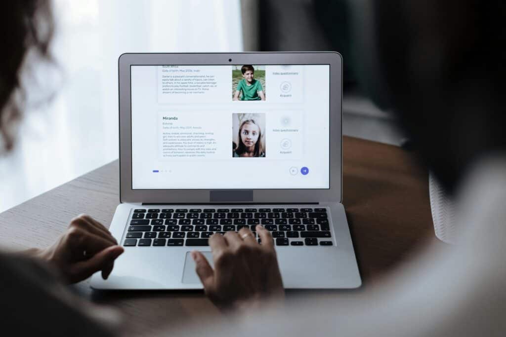 parents looking online at adoptable children from Estonia and South Africa