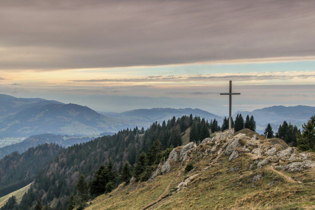 mountain tree scene with cross