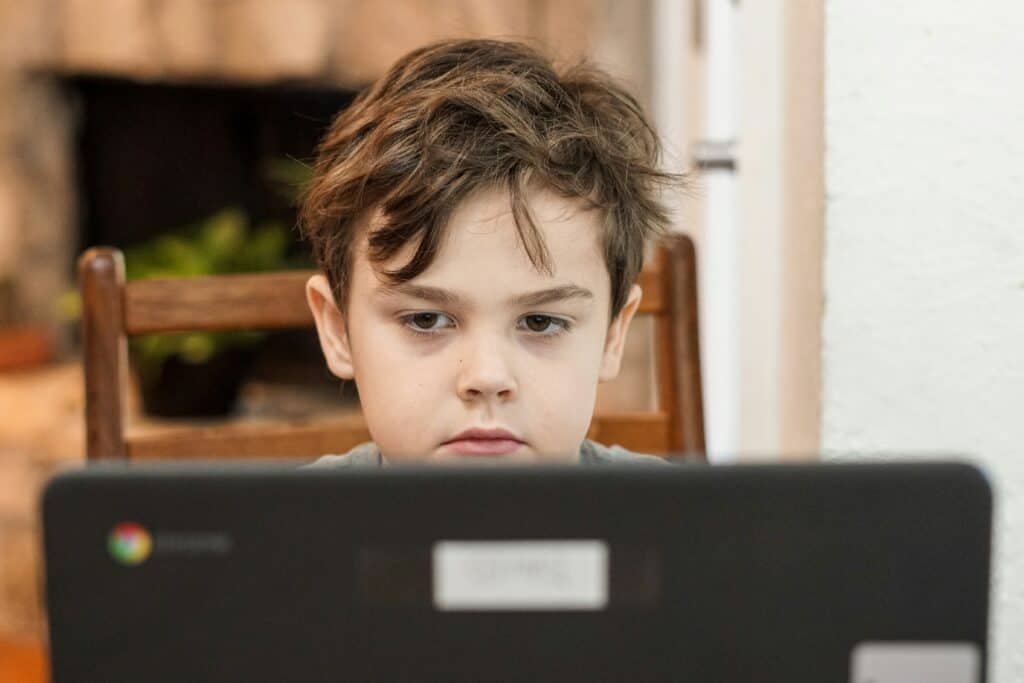 Boy working at computer