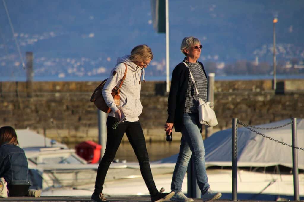 Mom and adult daughter walking