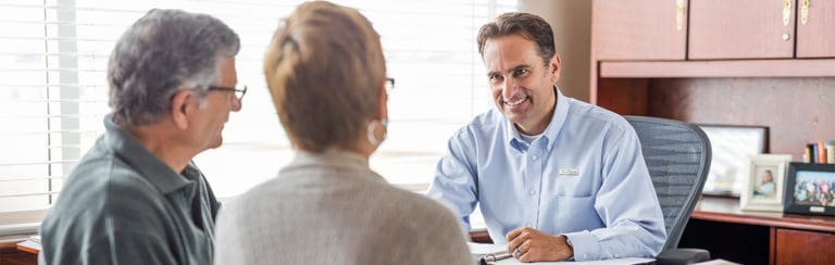 Grandparents discuss their planned giving with a consultant