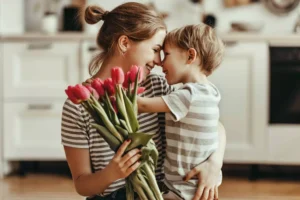 Mother and son with flowers on Mother's Day