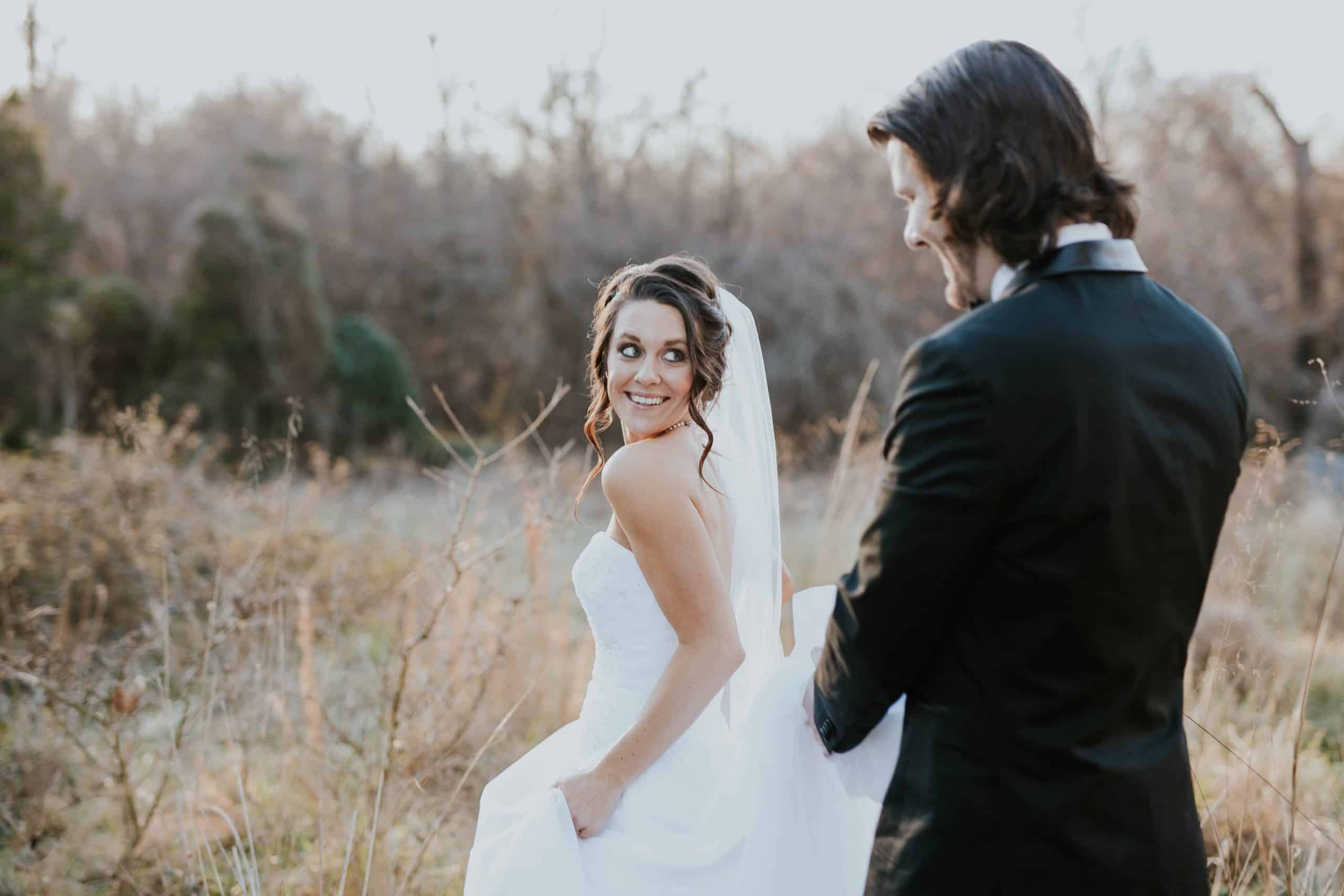 a married man and woman in a field