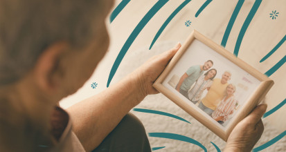 Parent looking at photo of prodigal child