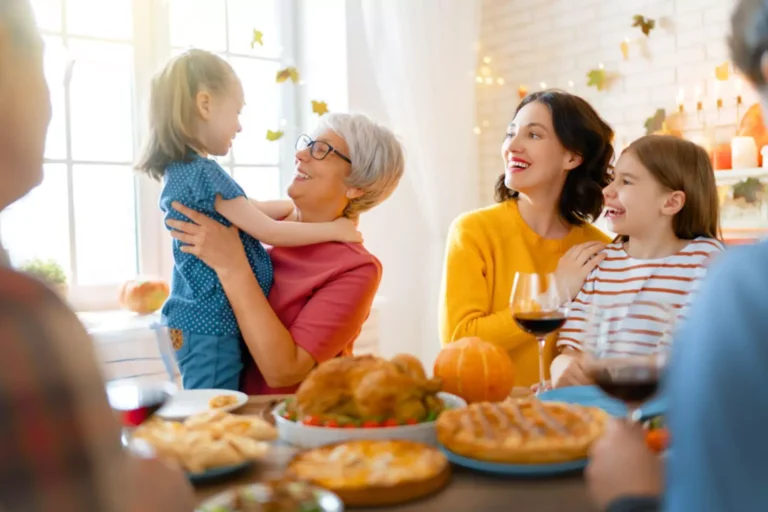 Thanksgiving gratitude. three generations gathered at the table for thanksgiving