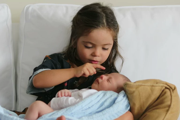 Prepare siblings like this little girl to welcome a newborn baby brother.