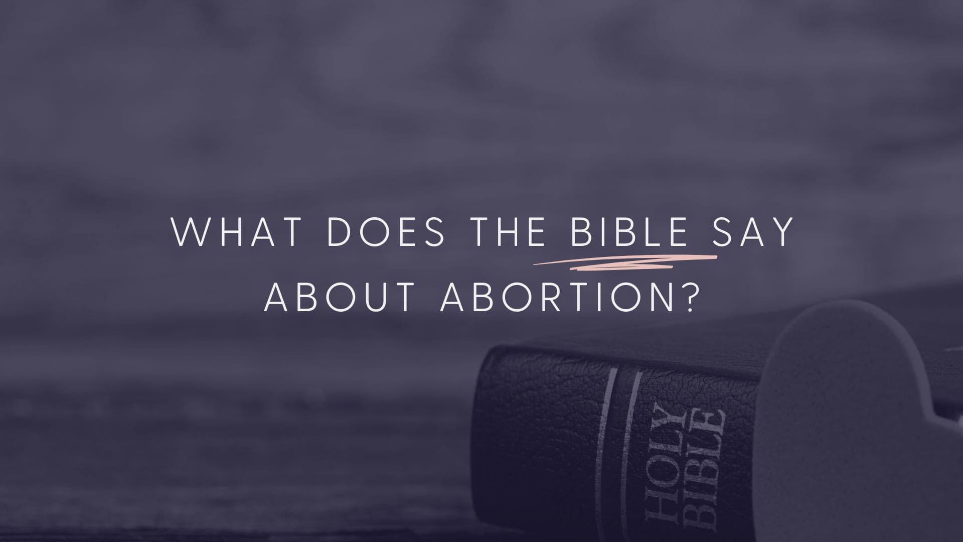 Picture of Bible and the words what does the Bible say about abortion