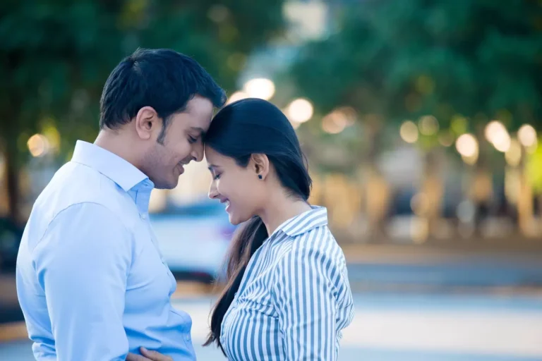 A man and a woman touch foreheads in a close, intimate moment in the park. Intimacy depends on how much we’re willing to reveal about ourselves beneath the surface. Here's how truth leads to intimacy with your spouse.
