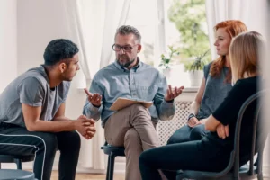 Two couples sit in a circle in discussion with one another. Finding a mentor couple willing to counsel you and your spouse takes time and effort. Here are practices you might find helpful.