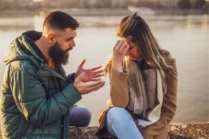 The reactive cycle of arguments. This couple sitting outside arguing