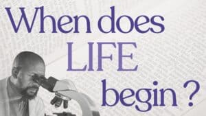 "When Does Life Begin" Cover image with the title and a scientist looking into a stethoscope with the bible in the background
